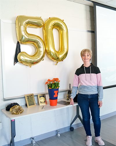 Tammy Smith with 50 number balloons